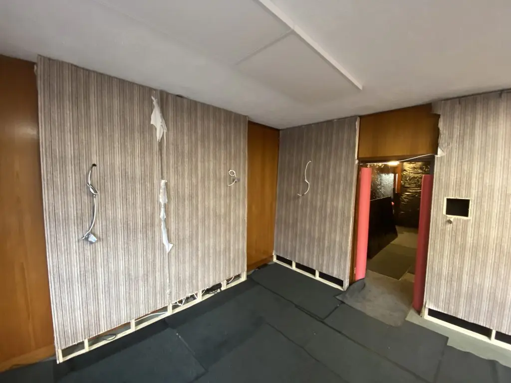 Film set decorating wallpaper repair